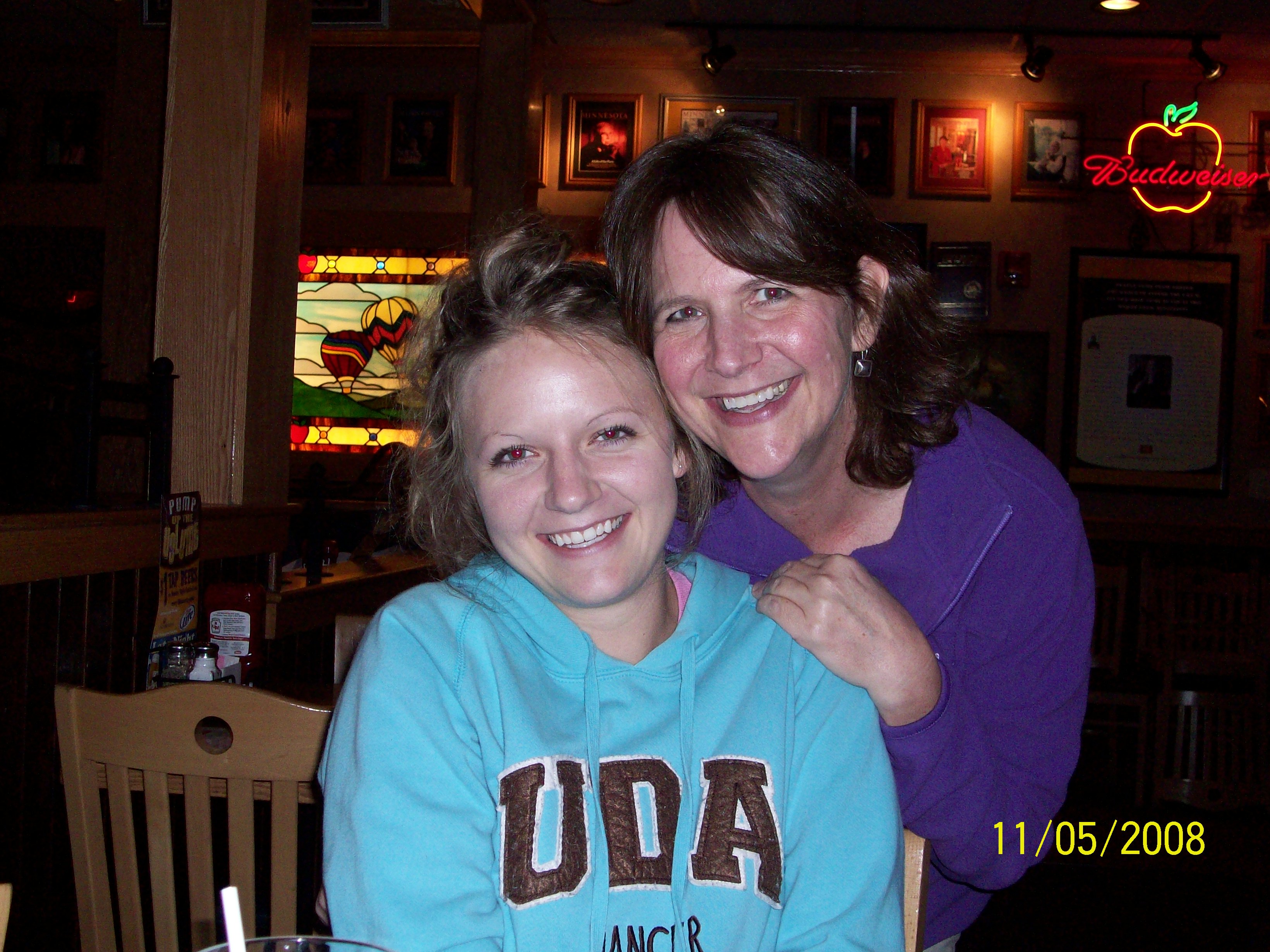 My sister Laurel and her daughter, Elizabeth at AppleBee's after a hard day of set-up.